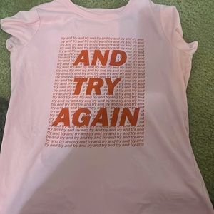 A pink Cat&Jack shirt with no stains or marks! Can be styled with jeans